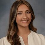 Rhea smiling