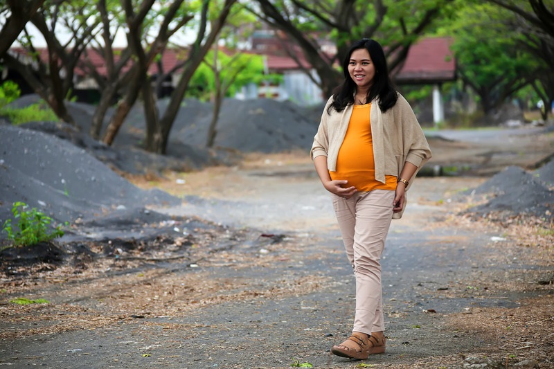 Canva – Photo of Pregnant Woman Walking on Pathway